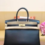 Birkin box black with gold buckle