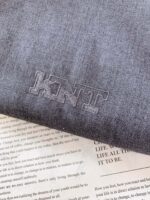 top, pantsKiton 2025FW Early Autumn New ProductCasual Hoodie Set | The Perfect Match of Neapolitan Craftsmanship and Modern LeisureTop: A Dual Play of Functionality and LuxuryThe hooded design injects casual tension into the shape while also considering practicality for daily wear. The three-dimensional KNT embroidery embellished on the garment and the brand logo on the buttons are a silent declaration of the brand's obsession with details. Selected high-end fabrics combine a crisp texture and comfortable drape, making it a casual item with a full tone when worn alone. The interior adds a sense of relaxation to formal wear, allowing for seamless switching between business and leisure scenes.Pants: a casual expression of high-end craftsmanshipThe pants adopt a micro elastic design, and the elastic design of the back waist hides a clever idea, which not only retains the sharp contour of the trousers, but also gives the wearer a comfortable experience without constraints. The same color KNT embroidery on the back pocket echoes the top, making the overall feel of the set stand out. Whether paired with a top to create a sophisticated look or worn alone to fit various shoe styles, it can easily embody the elegant and casual style of Neapolitan.From fabric selection to craftsmanship polishing, this hooded set embodies the brand's concept of "setting the tone for luxury leisure" and is a must-have for breaking through style boundaries in urban men's wardrobes.……………………………………………………❥∙Size：48-56 - Image 5