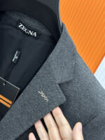 Zegna Jenia 25Fw Autumn/Winter New Collection! -ZEGN * A Men's Light Luxury Fashion Gentleman Wool Suit and Suit, choosing wool single silk is choosing a quality of life, making it a classic in your wardrobe, adding an elegant color to your life. A two button suit with urban fashion, casual and slim fit! 🍁🍁 Autumn is not just about fallen leaves, but also about new clothes. As the weather gradually cools down, a casual item is definitely your best choice. The whole suit is fresh and elegant, with a luxurious and trendy look for men. It exudes vitality while maintaining a graceful demeanor, with a handsome and stylish upper body that is easy to handle!Z suits are renowned for their exquisite craftsmanship and elegant styles. A high-end men's business mainline masterpiece, a suit selected by the elite of the men's clothing industry, and a highly practical casual single suit. A slim fit with a delicate flat collar and round pocket design. Continuing the contemporary style, the exquisite and beautiful Z family metal xxx series logo logo on the chest! Easy to disassemble, it also enhances the sense of design. The slim fit cutting and unique button design have become the visual focus. The channel suits are produced by an old factory, with first-class quality control, texture, and details. Give full dignity and honor.This suit is carefully crafted with high-quality 45% wool, 32% polyester fiber, 20% viscose fiber, and 3% spandex. Solid color wide and slim fit, twill fabric wool has a soft and comfortable feel, and the upper body is lightweight, stylish, and handsome! The fabric is soft, comfortable, and easy to wear, with strong wrinkle resistance. The better the quality of the suit, the more textured it is. The lining is made of satin and fabric, and the edging is exquisitely crafted. Its bone feel is reflected in the cutting of the pattern, which depends on the good cutting bed and professional suit factory.This is a slim fit version that leans towards a fashionable and casual style, making it suitable for formal occasions. Classic high-end gray, stylish and stylish, showcasing a passion and vitality for life.Color: Grey Angra RedSize: 48~58 (m~4xl) 178 135 pounds, wearing L slim fit, maximum wearing 190 pounds48: Chest circumference 100- Shoulder width 43- Sleeve length 60- Clothing length 6850: Chest circumference 104- Shoulder width 44- Sleeve length 61- Clothing length 6952: Chest circumference 108- Shoulder width 45- Sleeve length 62- Clothing length 7054: Chest circumference 112- Shoulder width 46- Sleeve length 63- Clothing length 7156: Chest circumference 116- Shoulder width 47- Sleeve length 64- Clothing length 7258: Chest circumference 120- Shoulder width 48- Sleeve length 65- Clothing length 73 - Image 4