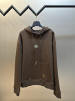Louis Vuitton Sunflower Hoodie: A Dazzling Fashion Statement
This Louis Vuitton sunflower hoodie is a true showstopper. The front is adorned with dazzling beadwork that intricately carves out Morgan - style floral motifs, resembling precious gems. It also incorporates a bolo - tie - inspired design, paired with a warm and sophisticated Tindal coffee - colored palette.

The embroidery is a masterpiece in itself. It features imported machine - embroidered phoenix eyes. Utilizing an advanced computer - controlled system and precision mechanical components, the embroidery boasts high accuracy, with smooth and delicate lines that add an extra layer of refinement.

Available in sizes S - XXL, this hoodie is a must - have for those who want to make a bold and stylish statement.