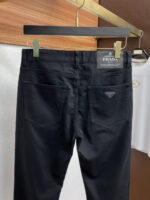 Prada's new spring/summer 2025 casual pants are cleanly cut, with a strong urban style. They are made of finely spun pure cotton fabric, which feels soft, sticky, and dry to the touch. The upper body effect is crisp and stylish. Exquisite hardware, very attractive for business and leisure. With so many top-notch materials, it creates a high-end product with unparalleled value, which is the first choice for high-end trendy and fashionable peopleSize: 30-38 - Image 9