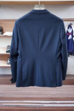 25SS autumn and winter new suit suit suit 🫑🫑 Two piece trendy and fashionable suit, a must-have item for business elite wardrobes, men's formal wear, fashionable and trendy wear, brand classic logo logo logo super generous, classic styles will be released every quarter! Wearing the pattern is really great, strongly recommended!Sharp and ergonomic tailoring, with a tall and handsome upper body, simple and elegant. Comfortable and slim fit, showcasing a gentlemanly demeanor at a glance. Made from carefully selected suit fabrics, including 20% wool, 18% viscose, 58% polyester, and 4% spandex, the fabric feels soft and delicate, with good luster and elasticity. The waist is made of sheepskin and leather, and is adorned with Louis Vuitton's soul logo embossed with letters! The silhouette and waist cinching add more comfort to the dressing of stylish men, making them look slim yet handsome!Used for making high-end professional and business formal suits, renowned worldwide for its classic and solemn design style. A high-end business casual suit set that requires high craftsmanship, takes a long time to make, and can be worn all year round!The fabric is flat, with a smooth and full texture, and a firm appearance. It is made of high-quality cotton wool material, and the quality of the material is visible when tied tightly.Regarding details: The high-end suit is cut with a modern feel, combining traditional cutting art with modern production techniques. It adopts fully imported automatic cutting pieces, with almost zero error in each piece of fabric, and then hand sewn by top tailors to ensure the fit and beauty of every part. The front two layers are saved, and according to the principles of ergonomics, it is slim fitting but not tight fitting. The elastic of the cow tendons on both sides of the waistband of the trousers can be adjusted! Not wearing tight waists!Classic collar design, classic style without conservatism, simple and elegant. The lining of the collar is made of pure handmade tribute needles, and we insist on hand sewing handicrafts, all of which are from the hands of experienced craftsmen. The quotation is based on the labor and time consumption per meter, and each stitch is rigorous and excellent, without any burrs or stitches on both sides. Handcrafted sleeves, hand nail buckles, hand calibration, and handmade threading can be seen everywhere, delicate and smooth, effectively reducing static electricity in autumn and winter, creating a high sense of unity on the surface and inside. It is worth buying for any man, as it can boost your face in various formal occasions!Color: Black【 Size 】: 46-56 - Image 9