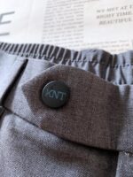 top, pantsKiton 2025FW Early Autumn New ProductCasual Hoodie Set | The Perfect Match of Neapolitan Craftsmanship and Modern LeisureTop: A Dual Play of Functionality and LuxuryThe hooded design injects casual tension into the shape while also considering practicality for daily wear. The three-dimensional KNT embroidery embellished on the garment and the brand logo on the buttons are a silent declaration of the brand's obsession with details. Selected high-end fabrics combine a crisp texture and comfortable drape, making it a casual item with a full tone when worn alone. The interior adds a sense of relaxation to formal wear, allowing for seamless switching between business and leisure scenes.Pants: a casual expression of high-end craftsmanshipThe pants adopt a micro elastic design, and the elastic design of the back waist hides a clever idea, which not only retains the sharp contour of the trousers, but also gives the wearer a comfortable experience without constraints. The same color KNT embroidery on the back pocket echoes the top, making the overall feel of the set stand out. Whether paired with a top to create a sophisticated look or worn alone to fit various shoe styles, it can easily embody the elegant and casual style of Neapolitan.From fabric selection to craftsmanship polishing, this hooded set embodies the brand's concept of "setting the tone for luxury leisure" and is a must-have for breaking through style boundaries in urban men's wardrobes.……………………………………………………❥∙Size：48-56 - Image 5
