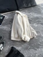 🆕- This woolen coat brings out the classic style with contemporary poetryWhen 72.1% sheep wool meets 27.9% polyester fiber, it weaves not only fabric, but also gentle armor that can withstand the test of time. The fleece surface has a fine luster, like a beach smoothed by the sea breeze. The light sand color will give off a warm luster like oatmeal Congee in the sun, and it will show the calm texture of gypsum sculpture in cloudy days.The arrangement of six buttons hides a thought-provoking rhythm - the four large buttons on the collar sound like piano accents, and the two small buttons on the hem sound like a light finish. This staggered design gives the placket a sense of rhythm amidst its regularity. The curve of the lapel is cut perfectly, which not only fits the collar shape of the shirt perfectly, but also outlines a graceful line when lifted in the wind.The round bottom patch pocket on the left chest is exquisitely crafted, with a curved bottom that makes the intervention posture more ergonomic. The slanted pockets on both sides have enough capacity to store hands, and the natural warmth of wool keeps fingertips warm even in cold winds. The most wonderful feature is the asymmetrical design of the cuffs - the outer knitted thread is windproof and warm, while the inner fabric continues the overall texture. The splicing details exposed when lifting the hand add a touch of fun.The one-piece cut on the back fully showcases the drape of the woolen fabric, and the hem forms smooth waves as you walk. The wine red lining inside is like a secret hidden in a suit, and the bright colors that catch a glimpse every time you take off are a small sense of ceremony unique to the wearer. The dual pocket design added to the side is both practical and considerate, allowing the phone and key to be placed separately without colliding with each other in the pocket.This jacket embodies the contemporary language of classic items, featuring a sturdy frame supported by polyester fibers, a soft and comfortable fit with plush wool, and asymmetrical cuffs for attention to detail. When others are still struggling with matching, this light sand colored jacket has already become the most sensible member in the wardrobe, easy to handle whether paired with jeans or trousers. In today's fast-paced fashion world, a wool jacket that can accompany you for many years but becomes even more flavorful is the true wardrobe cornerstone worth investing in.Color: Light Sand174-140 upper body size LSize: M-XXXL (48-56)Item number: FXHK8621M size bust circumference 114 shoulder width 47.8 sleeve length 60 garment length 62.5L size bust circumference 118 shoulder width 49 sleeve length 61.5 clothing length 64XL chest circumference 122 shoulder width 50.2 sleeve length 63 garment length 65.5XXL bust circumference 126 shoulder width 51.4 sleeve length 63.5 garment length 66.5XXXL bust circumference 130 shoulder width 52.6 sleeve length 64 garment length 67.5 - Image 4