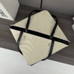 L⊚℮w℮新款🆕 Puzzle Fold手袋  手袋从品牌经典手袋系列的几何线条汲取灵感含几何建筑美感的镶片重新诠释，经巧呈现能够完全扁平折叠，可谓旅行品牌运用创意巧思打造柔软轻盈的手袋，此版本采用棉质提花，搭配牛皮革提手 🉑️肩背或手提 植物衬里*L⊚℮w℮刺绣
size:25.5*14.5*31.5CＭ
型号：052404 - Image 6
