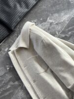🆕- This woolen coat brings out the classic style with contemporary poetryWhen 72.1% sheep wool meets 27.9% polyester fiber, it weaves not only fabric, but also gentle armor that can withstand the test of time. The fleece surface has a fine luster, like a beach smoothed by the sea breeze. The light sand color will give off a warm luster like oatmeal Congee in the sun, and it will show the calm texture of gypsum sculpture in cloudy days.The arrangement of six buttons hides a thought-provoking rhythm - the four large buttons on the collar sound like piano accents, and the two small buttons on the hem sound like a light finish. This staggered design gives the placket a sense of rhythm amidst its regularity. The curve of the lapel is cut perfectly, which not only fits the collar shape of the shirt perfectly, but also outlines a graceful line when lifted in the wind.The round bottom patch pocket on the left chest is exquisitely crafted, with a curved bottom that makes the intervention posture more ergonomic. The slanted pockets on both sides have enough capacity to store hands, and the natural warmth of wool keeps fingertips warm even in cold winds. The most wonderful feature is the asymmetrical design of the cuffs - the outer knitted thread is windproof and warm, while the inner fabric continues the overall texture. The splicing details exposed when lifting the hand add a touch of fun.The one-piece cut on the back fully showcases the drape of the woolen fabric, and the hem forms smooth waves as you walk. The wine red lining inside is like a secret hidden in a suit, and the bright colors that catch a glimpse every time you take off are a small sense of ceremony unique to the wearer. The dual pocket design added to the side is both practical and considerate, allowing the phone and key to be placed separately without colliding with each other in the pocket.This jacket embodies the contemporary language of classic items, featuring a sturdy frame supported by polyester fibers, a soft and comfortable fit with plush wool, and asymmetrical cuffs for attention to detail. When others are still struggling with matching, this light sand colored jacket has already become the most sensible member in the wardrobe, easy to handle whether paired with jeans or trousers. In today's fast-paced fashion world, a wool jacket that can accompany you for many years but becomes even more flavorful is the true wardrobe cornerstone worth investing in.Color: Light Sand174-140 upper body size LSize: M-XXXL (48-56)Item number: FXHK8621M size bust circumference 114 shoulder width 47.8 sleeve length 60 garment length 62.5L size bust circumference 118 shoulder width 49 sleeve length 61.5 clothing length 64XL chest circumference 122 shoulder width 50.2 sleeve length 63 garment length 65.5XXL bust circumference 126 shoulder width 51.4 sleeve length 63.5 garment length 66.5XXXL bust circumference 130 shoulder width 52.6 sleeve length 64 garment length 67.5 - Image 5