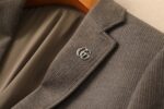 Gucc G's new men's wool suit jacket for autumn and winter 2025 is made to high standards with top-notch ready to wear clothing. It is custom-made in Italy with wool fabric, which has a delicate and soft touch. The upper body is firm and stylish, with a natural and comfortable texture. The fabric continuity is excellent, and the upper body effect is superb, suitable for any body shape. The overall brand is decorated with Thousand Bird Grid craftsmanship, exuding a strong sense of luxury. The design of two buttons, atmospheric and perfect ready to wear cut, stands out in terms of styling effect, and is a must-have for urban early autumn casual matching. Size: M-4XL slim fit 178 135 L slim fit maximum weight 190 pounds - Image 9