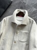 🆕- This woolen coat brings out the classic style with contemporary poetryWhen 72.1% sheep wool meets 27.9% polyester fiber, it weaves not only fabric, but also gentle armor that can withstand the test of time. The fleece surface has a fine luster, like a beach smoothed by the sea breeze. The light sand color will give off a warm luster like oatmeal Congee in the sun, and it will show the calm texture of gypsum sculpture in cloudy days.The arrangement of six buttons hides a thought-provoking rhythm - the four large buttons on the collar sound like piano accents, and the two small buttons on the hem sound like a light finish. This staggered design gives the placket a sense of rhythm amidst its regularity. The curve of the lapel is cut perfectly, which not only fits the collar shape of the shirt perfectly, but also outlines a graceful line when lifted in the wind.The round bottom patch pocket on the left chest is exquisitely crafted, with a curved bottom that makes the intervention posture more ergonomic. The slanted pockets on both sides have enough capacity to store hands, and the natural warmth of wool keeps fingertips warm even in cold winds. The most wonderful feature is the asymmetrical design of the cuffs - the outer knitted thread is windproof and warm, while the inner fabric continues the overall texture. The splicing details exposed when lifting the hand add a touch of fun.The one-piece cut on the back fully showcases the drape of the woolen fabric, and the hem forms smooth waves as you walk. The wine red lining inside is like a secret hidden in a suit, and the bright colors that catch a glimpse every time you take off are a small sense of ceremony unique to the wearer. The dual pocket design added to the side is both practical and considerate, allowing the phone and key to be placed separately without colliding with each other in the pocket.This jacket embodies the contemporary language of classic items, featuring a sturdy frame supported by polyester fibers, a soft and comfortable fit with plush wool, and asymmetrical cuffs for attention to detail. When others are still struggling with matching, this light sand colored jacket has already become the most sensible member in the wardrobe, easy to handle whether paired with jeans or trousers. In today's fast-paced fashion world, a wool jacket that can accompany you for many years but becomes even more flavorful is the true wardrobe cornerstone worth investing in.Color: Light Sand174-140 upper body size LSize: M-XXXL (48-56)Item number: FXHK8621M size bust circumference 114 shoulder width 47.8 sleeve length 60 garment length 62.5L size bust circumference 118 shoulder width 49 sleeve length 61.5 clothing length 64XL chest circumference 122 shoulder width 50.2 sleeve length 63 garment length 65.5XXL bust circumference 126 shoulder width 51.4 sleeve length 63.5 garment length 66.5XXXL bust circumference 130 shoulder width 52.6 sleeve length 64 garment length 67.5 - Image 7