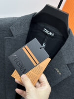 Zegna Jenia 25Fw Autumn/Winter New Collection! -ZEGN * A Men's Light Luxury Fashion Gentleman Wool Suit and Suit, choosing wool single silk is choosing a quality of life, making it a classic in your wardrobe, adding an elegant color to your life. A two button suit with urban fashion, casual and slim fit! 🍁🍁 Autumn is not just about fallen leaves, but also about new clothes. As the weather gradually cools down, a casual item is definitely your best choice. The whole suit is fresh and elegant, with a luxurious and trendy look for men. It exudes vitality while maintaining a graceful demeanor, with a handsome and stylish upper body that is easy to handle!Z suits are renowned for their exquisite craftsmanship and elegant styles. A high-end men's business mainline masterpiece, a suit selected by the elite of the men's clothing industry, and a highly practical casual single suit. A slim fit with a delicate flat collar and round pocket design. Continuing the contemporary style, the exquisite and beautiful Z family metal xxx series logo logo on the chest! Easy to disassemble, it also enhances the sense of design. The slim fit cutting and unique button design have become the visual focus. The channel suits are produced by an old factory, with first-class quality control, texture, and details. Give full dignity and honor.This suit is carefully crafted with high-quality 45% wool, 32% polyester fiber, 20% viscose fiber, and 3% spandex. Solid color wide and slim fit, twill fabric wool has a soft and comfortable feel, and the upper body is lightweight, stylish, and handsome! The fabric is soft, comfortable, and easy to wear, with strong wrinkle resistance. The better the quality of the suit, the more textured it is. The lining is made of satin and fabric, and the edging is exquisitely crafted. Its bone feel is reflected in the cutting of the pattern, which depends on the good cutting bed and professional suit factory.This is a slim fit version that leans towards a fashionable and casual style, making it suitable for formal occasions. Classic high-end gray, stylish and stylish, showcasing a passion and vitality for life.Color: Grey Angra RedSize: 48~58 (m~4xl) 178 135 pounds, wearing L slim fit, maximum wearing 190 pounds48: Chest circumference 100- Shoulder width 43- Sleeve length 60- Clothing length 6850: Chest circumference 104- Shoulder width 44- Sleeve length 61- Clothing length 6952: Chest circumference 108- Shoulder width 45- Sleeve length 62- Clothing length 7054: Chest circumference 112- Shoulder width 46- Sleeve length 63- Clothing length 7156: Chest circumference 116- Shoulder width 47- Sleeve length 64- Clothing length 7258: Chest circumference 120- Shoulder width 48- Sleeve length 65- Clothing length 73 - Image 5