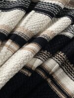 🆕- This knitted sweater weaves a Mediterranean breeze into the wardrobeWhen 10 cotton yarns and 46 blended yarns meet on a seven needle jacquard machine, the three yarns begin to weave a dialogue about material and color. Navy blue and navy blue cotton yarn have a rough and rustic feel, like the late night waters of the Adriatic Sea; The addition of 3.7% mulberry silk and wool in the light camel colored blended yarn gives the striped edges a subtle luster, reminiscent of the sparkling waves at sunset in Venice.When the weight of 580 grams is unfolded in the hand, one can feel the delicate balance between the stiffness of cotton and the softness of blended yarn. The vertical jacquard woven alternately with osmanthus needles and hanging needles forms a subtle texture on the navy blue background, resembling the outline of Venetian architecture seen through blinds. The white version is like a linen cloth sprinkled with sunlight, and the collision of the three materials is portrayed more clearly on a pure white canvas.The curvature of the round neck continues the elegant tradition of Italian tailoring, neither tightening the neck nor maintaining sharp lines. The contraction process of the hem keeps the hem of the garment firmly attached to the waist, and it will not move up whether you lift your hand or turn around. To support the muscles and bones with 10 strands of cotton yarn, to outline with delicate 46 strands of blended yarn, and to add luster and mulberry silk embellishment - this knitted sweater weaves the advantages of different materials into the same picture.The navy blue version paired with white pants is a classic Mediterranean style, while the white version paired with dark gray trousers can instantly switch to Milan style urban elegance. The intentions hidden in the texture of osmanthus needles, yarn blending, and precise weight all need to be personally felt in the cool autumn breeze to fully understand. While others are still struggling with the basic knitwear, this three layered jacquard sweater has already captivated the eyes of those who understand it with its sense of layering.In the current era of fast fashion proliferation, a blend knit that becomes softer and skin friendly with increasing wear is the truly worthwhile wardrobe evergreen tree to invest in. Jay Ya uses this piece to prove that a sophisticated sense of leisure allows every material to find the most comfortable expression in fabric.Color: White navy blue174-140 upper body size LSize: M-XXXL (48-56)Style number: FXZZ8688M size bust circumference 104 shoulder width 46.5 sleeve length 56 garment length 64.5Size L Chest circumference 108 Shoulder width 48 Sleeve length 57 Clothing length 66XL bust circumference 112 shoulder width 49.5 sleeve length 58 garment length 67.5XXL chest circumference 116 shoulder width 51 sleeve length 59 garment length 68.5XXXL bust circumference 120 shoulder width 52.5 sleeve length 60 garment length 69.5 - Image 9