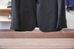 Fendi/25SS autumn and winter new suit suit suit 🫑🫑 Two piece trendy and fashionable suit, a must-have item for business elite wardrobes, men's formal wear, fashionable and trendy wear, brand classic logo logo logo super generous, classic styles will be released every quarter! Wearing the pattern is really great, strongly recommended!Sharp and ergonomic tailoring, with a tall and handsome upper body, simple and elegant. Comfortable and slim fit, showcasing a gentlemanly demeanor at a glance. Made from carefully selected suit fabrics, including 20% wool, 18% viscose, 58% polyester, and 4% spandex, the fabric feels soft and delicate, with good luster and elasticity. The waist is made of sheepskin and leather, and is adorned with Louis Vuitton's soul logo embossed with letters! The silhouette and waist cinching add more comfort to the dressing of stylish men, making them look slim yet handsome!Used for making high-end professional and business formal suits, renowned worldwide for its classic and solemn design style. A high-end business casual suit set that requires high craftsmanship, takes a long time to make, and can be worn all year round!The fabric is flat, with a smooth and full texture, and a firm appearance. It is made of high-quality cotton wool material, and the quality of the material is visible when tied tightly.Regarding details: The high-end suit is cut with a modern feel, combining traditional cutting art with modern production techniques. It adopts fully imported automatic cutting pieces, with almost zero error in each piece of fabric, and then hand sewn by top tailors to ensure the fit and beauty of every part. The front two layers are saved, and according to the principles of ergonomics, it is slim fitting but not tight fitting. The elastic of the cow tendons on both sides of the waistband of the trousers can be adjusted! Not wearing tight waists!Classic collar design, classic style without conservatism, simple and elegant. The lining of the collar is made of pure handmade tribute needles, and we insist on hand sewing handicrafts, all of which are from the hands of experienced craftsmen. The quotation is based on the labor and time consumption per meter, and each stitch is rigorous and excellent, without any burrs or stitches on both sides. Handcrafted sleeves, hand nail buckles, hand calibration, and handmade threading can be seen everywhere, delicate and smooth, effectively reducing static electricity in autumn and winter, creating a high sense of unity on the surface and inside. It is worth buying for any man, as it can boost your face in various formal occasions!Color: Black【 Size 】: 46-56 - Image 5
