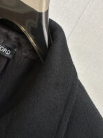 TF Tom Ford 2025 Autumn/Winter Men's Cashmere Coat: Defining Elegant Style with IngenuityOn the advanced path of autumn and winter wardrobes, a coat that combines texture and design is the core item that interprets taste. Tom Ford's new men's cashmere coat for autumn and winter 2025 continues the brand's commitment to luxury aesthetics, blending superior materials with exquisite tailoring to create a classic dressing choice for contemporary men that transcends occasions.The fabric serves as the cornerstone of texture, and this coat is made from imported Australian cashmere wool, sourced from high-quality Merino sheep wool fibers in Australia. The diameter is delicate and naturally curly, and after exquisite craftsmanship, it is woven into a fabric that combines a soft and skin friendly touch with excellent warmth. This fabric not only has excellent drape and can naturally fit the body's lines, but also has good wrinkle resistance and moisture wicking ability. Even in dry autumn and winter, it can maintain a comfortable and firm wearing experience.In terms of design, the mid to long silhouette balances warmth and body shaping effects, with a length that covers the hips perfectly, avoiding the thinness of the short silhouette and eliminating the need to worry about the drag of the long silhouette, making it suitable for various body types. The highlight is the back waistband design, which continues Tom Ford's precise control of line balance - presenting a relaxed and elegant casual posture when loosened, and outlining a sharp waistline when fastened, breaking the dullness of traditional coats and hiding design ingenuity in the minimalist silhouette.From formal attire for business commuting to casual wear for casual occasions, this coat can seamlessly adapt. Paired with a shirt and trousers, it is a low-key and introverted workplace style; Paired with a knitted sweater and casual pants, it reveals a calm and composed daily taste. The design language without exaggerated logos is precisely the embodiment of the brand's "low-key luxury" concept, making texture the best business card.Tom Ford's men's cashmere coat for autumn and winter 2025, with the natural luxury of Australian cashmere wool as the bone and the exquisite design of the back and waist as the soul, creates a wardrobe collection that can travel through time.Size: M-3XL - Image 8