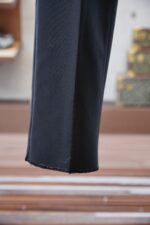 Dior -25SS autumn and winter new suit suit suit 🫑🫑 Two piece trendy and fashionable suit, a must-have item for business elite wardrobes, men's formal wear, fashionable and trendy wear, brand classic logo logo logo super generous, classic styles will be released every quarter! Wearing the pattern is really great, strongly recommended!Sharp and ergonomic tailoring, with a tall and handsome upper body, simple and elegant. Comfortable and slim fit, showcasing a gentlemanly demeanor at a glance. Made from carefully selected suit fabrics, including 20% wool, 18% viscose, 58% polyester, and 4% spandex, the fabric feels soft and delicate, with good luster and elasticity. The waist is made of sheepskin and leather, and is adorned with Louis Vuitton's soul logo embossed with letters! The silhouette and waist cinching add more comfort to the dressing of stylish men, making them look slim yet handsome!Used for making high-end professional and business formal suits, renowned worldwide for its classic and solemn design style. A high-end business casual suit set that requires high craftsmanship, takes a long time to make, and can be worn all year round!The fabric is flat, with a smooth and full texture, and a firm appearance. It is made of high-quality cotton wool material, and the quality of the material is visible when tied tightly.Regarding details: The high-end suit is cut with a modern feel, combining traditional cutting art with modern production techniques. It adopts fully imported automatic cutting pieces, with almost zero error in each piece of fabric, and then hand sewn by top tailors to ensure the fit and beauty of every part. The front two layers are saved, and according to the principles of ergonomics, it is slim fitting but not tight fitting. The elastic of the cow tendons on both sides of the waistband of the trousers can be adjusted! Not wearing tight waists!Classic collar design, classic style without conservatism, simple and elegant. The lining of the collar is made of pure handmade tribute needles, and we insist on hand sewing handicrafts, all of which are from the hands of experienced craftsmen. The quotation is based on the labor and time consumption per meter, and each stitch is rigorous and excellent, without any burrs or stitches on both sides. Handcrafted sleeves, hand nail buckles, hand calibration, and handmade threading can be seen everywhere, delicate and smooth, effectively reducing static electricity in autumn and winter, creating a high sense of unity on the surface and inside. It is worth buying for any man, as it can boost your face in various formal occasions!Color: Black【 Size 】: 46-56 - Image 5